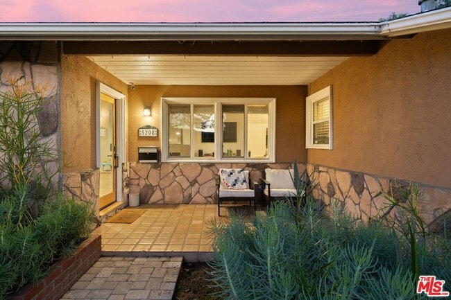 Building Photo - 5208 Woodman Ave