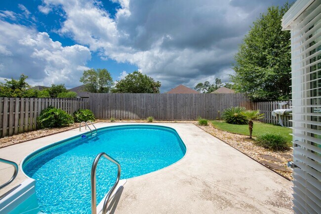 Building Photo - Luxury Living with Saltwater Pool, Florida Room & Generator