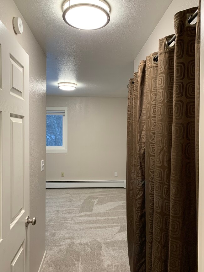 Building Photo - 2201 E 66th Ave