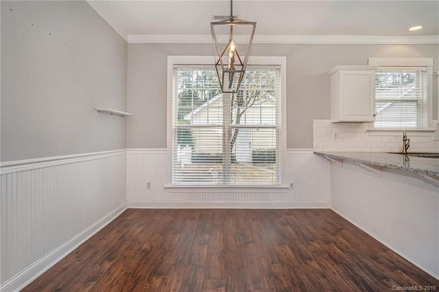 Dinning room with updated lighting - 11323 Deer Ridge Ln