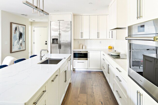 Building Photo - 1 Bed • 1.5 Bath • Garage Parking • New Luxury Building – Available now, February, March or April...