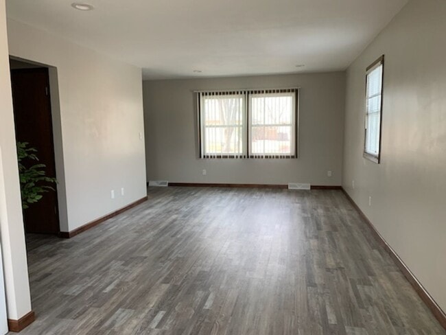 Building Photo - Updated 2BR/1.5BA with garage, lawn care included