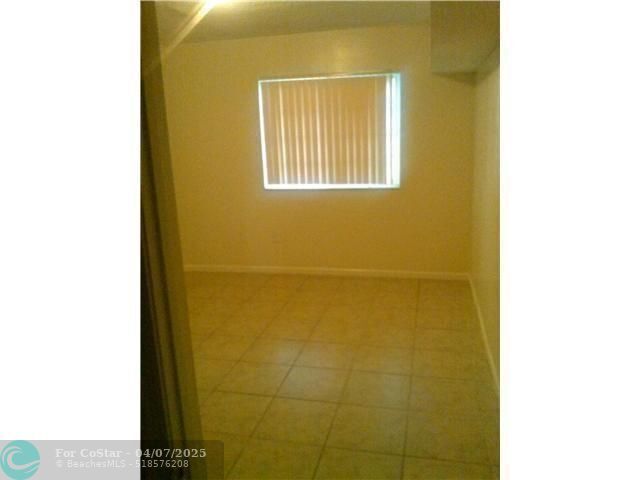 Building Photo - 3241 Sabal Palm Manor