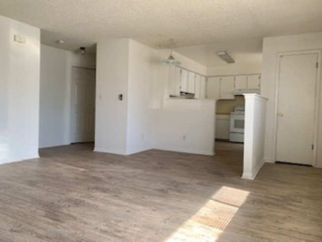 Building Photo - Two Bedroom Condo With  Garage Available F...