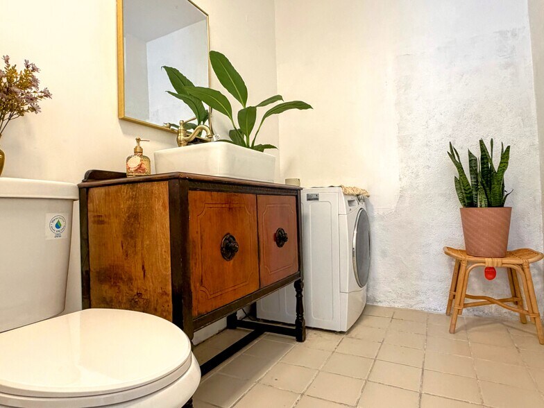 Hallway restroom with washer - 1369 Helen Dr