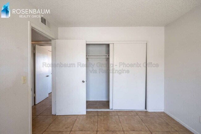 Building Photo - 6440 E Alder Ave