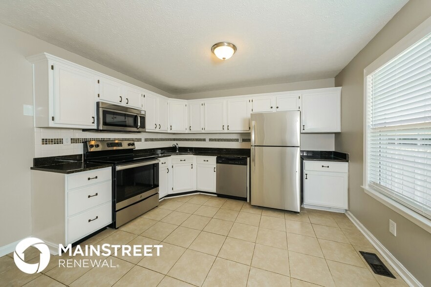 Building Photo - 8908 Greenmoore Dr