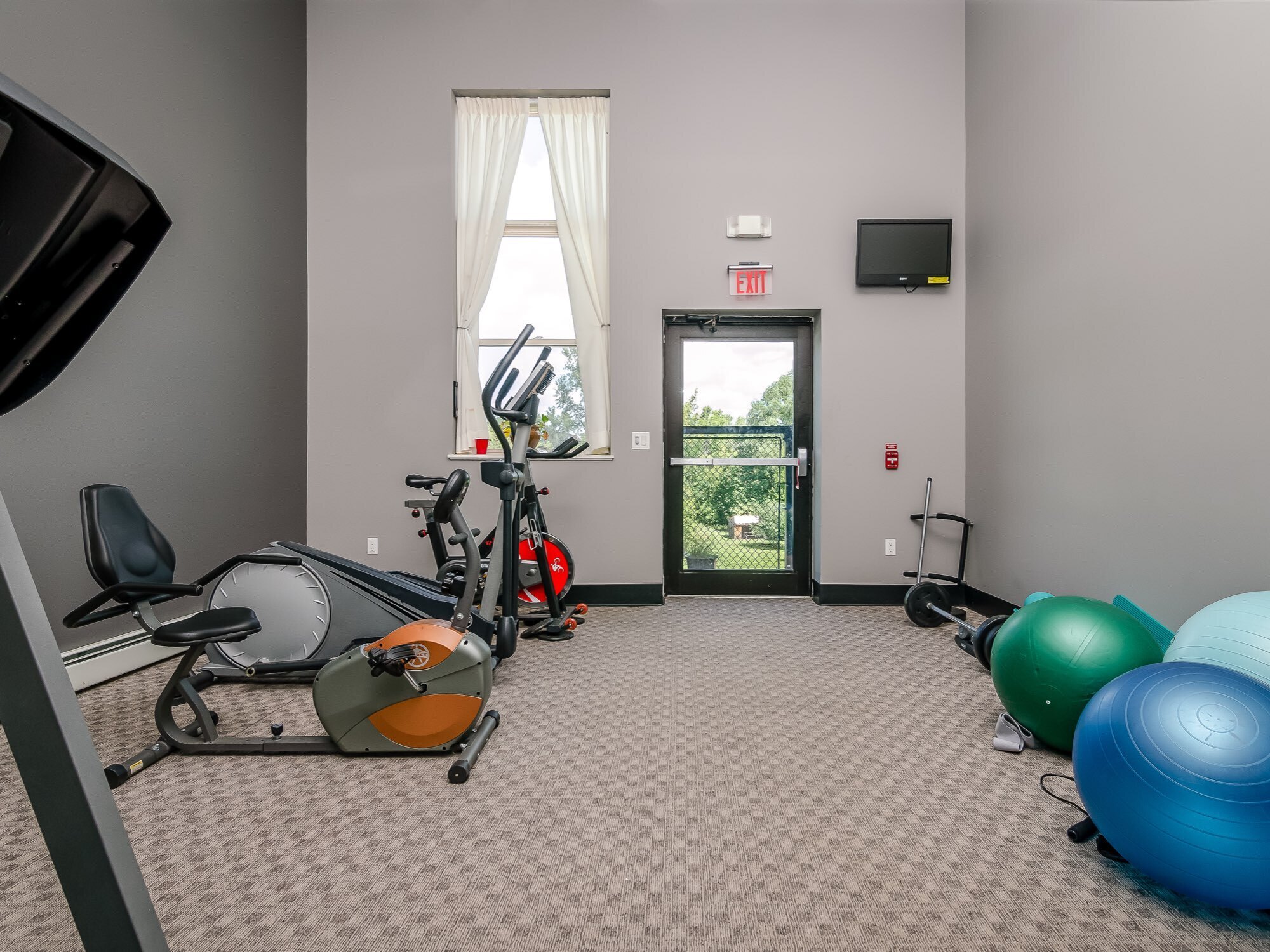 Community FItness Center on 3rd floor of building - 208 W Broadway St