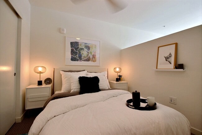 Crew Apartments Apartment Home Bedroom Bed and Nightstand - Crew Apartments