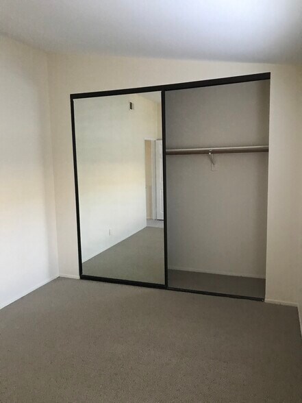 Bedroom with large closet - 1209 Robinson Ave