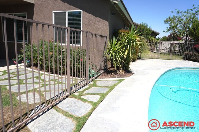 Building Photo - Stunning Split-Wing Home in Bakersfield's Desirable 93314 — Pool, Upgrades Throughout & Pets Welc...