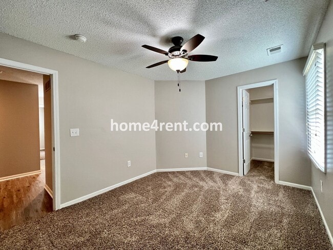 Building Photo - Updated Kitchen, Large Two Tiered Deck, Finished Basement in Blue Valley Schools!