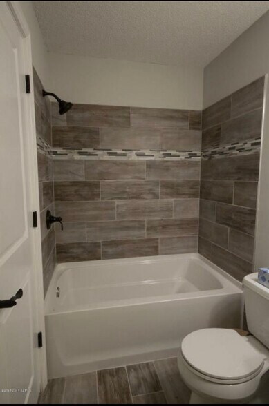 Primary bathroom on first floor - 7 Christie Ln