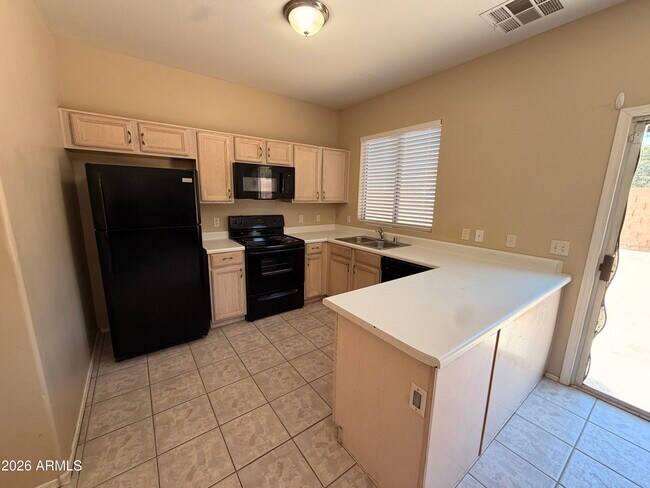Building Photo - 1227 S 119th Ln