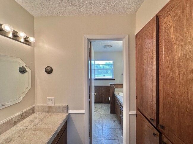 Building Photo - Spacious 4-Bedroom Home on a Corner Lot wi...