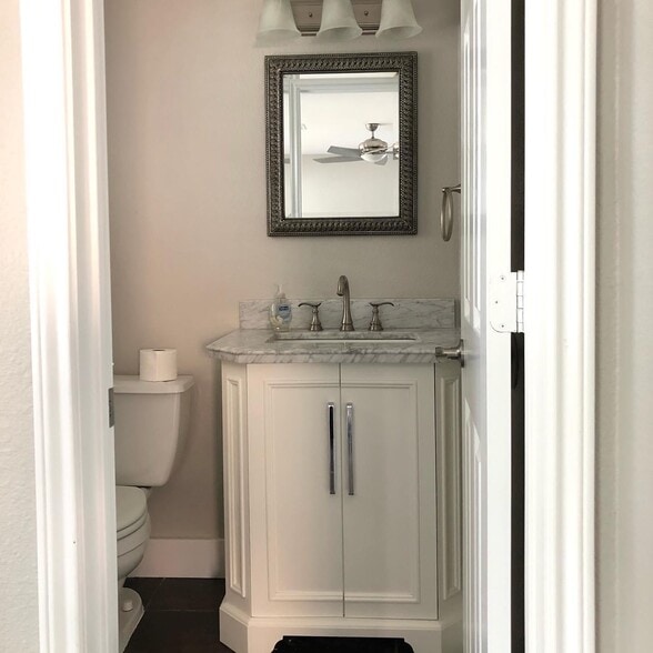 Downstairs half bath off living area - 615 Big Spring Dr