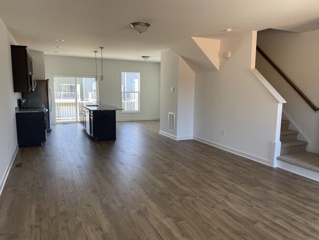 Living room looking into kitchen - 196 Colony Ave