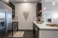 Building Photo - Your Downtown Lifestyle Begins Now