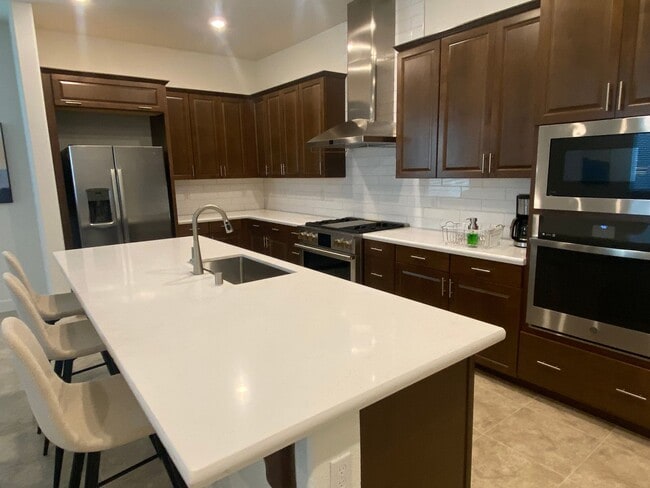 Building Photo - FULLY FURNISHED - ALMOST NEW 4 BED, 2.5 BATHS, 2 CAR GARAGE, 1 STORY IN NORTH LAKE COMMUNITY, NOR...