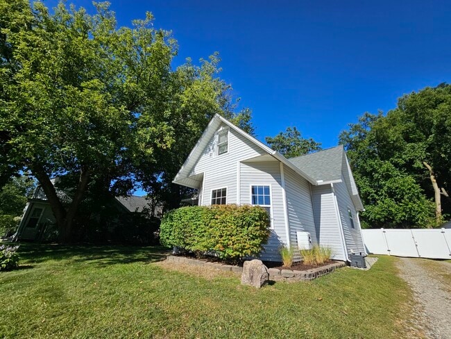 End of driveway - 207 S East St