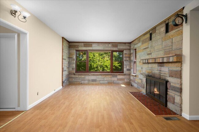 Building Photo - Elegant Multi-Level Brick Residence with Outdoor Oasis