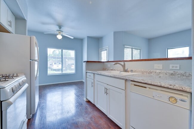 Building Photo - NW!! Gated!!! Clubhouse!!!Community Pool!!! 1st Floor Condo!!! Wood like floors!! No Carpet!!