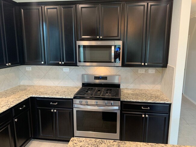 Building Photo - *COMING SOON* Spacious 4-Bedroom Home Near Briggs Ranch – Loft, Covered Patio & More!