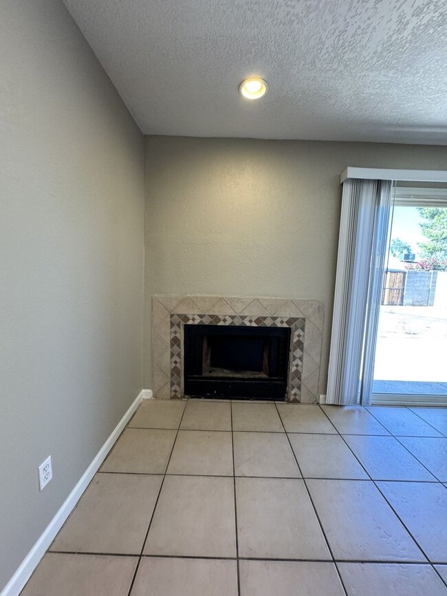 Building Photo - CORNER LOT 3 BEDROOM PLUS DEN WITH FIREPLACE AND LARGE YARD