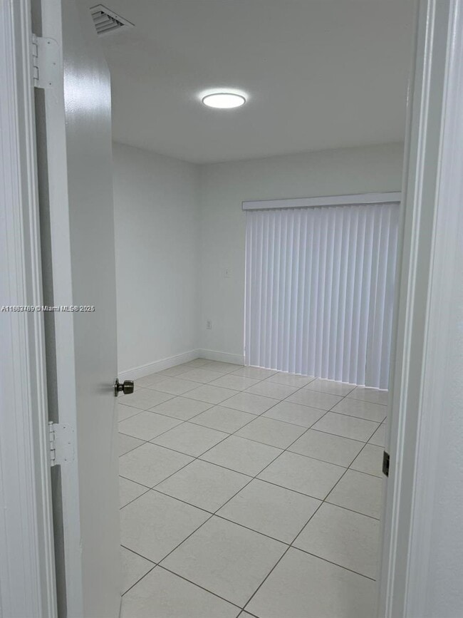 Building Photo - 27070 SW 134th Pl