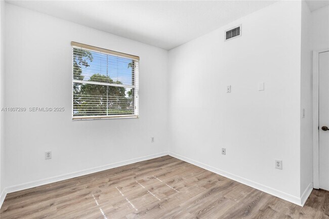 Building Photo - 6700 NW 114th Ave