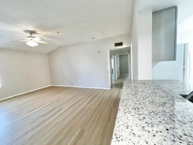 Building Photo - NEW-Remodeled bathroom & kitchen! NEW VINYL PLANK flooring & fresh paint! 2 bedroom 1 bath condo ...
