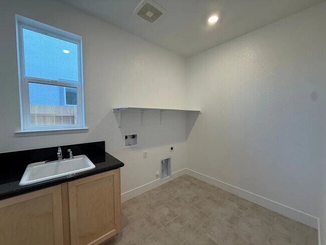 Building Photo - Be the first to enjoy this beautiful, newly built home near the Wild Hawk Golf Club