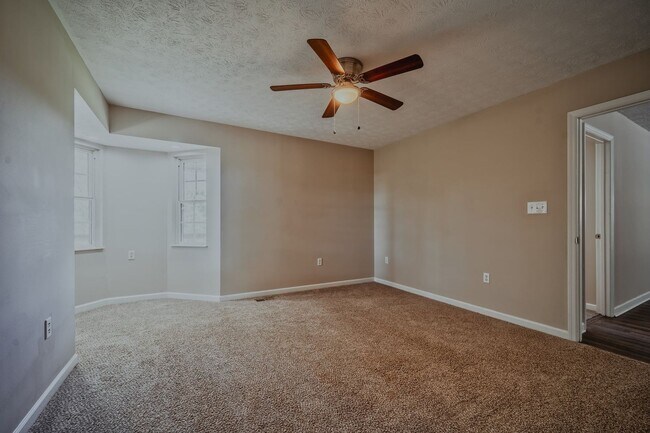 Building Photo - SHORT TERM - Spacious 3-Bedroom home with Wrap-Around Porch