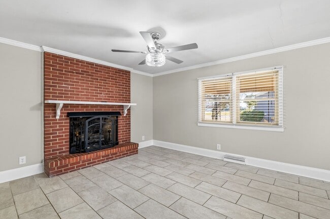 Building Photo - Elon - Large Brick Home, Hardwoods, Granite Counter-Tops, SS Appliances, Fire Place, Carport - Mu...