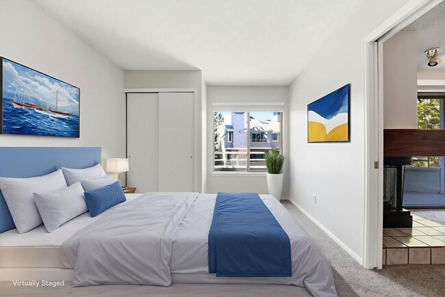 Building Photo - Charming 2 Bedroom Second Story Condo with easy access to everything!