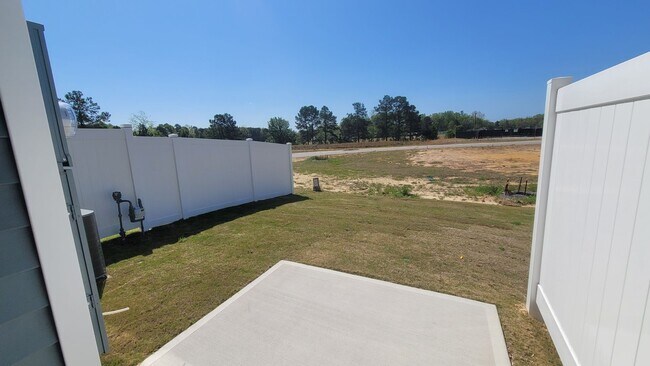 Building Photo - Beautiful New Townhome for Military Tenant