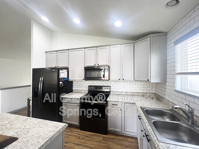 Building Photo - 6168 Rocking Chair Ln