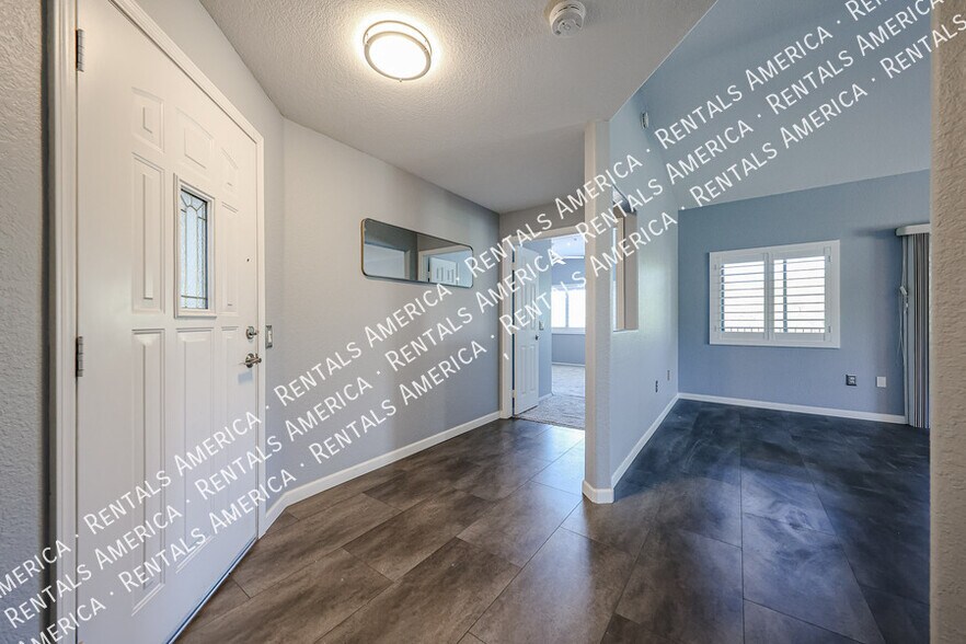 Building Photo - 9555 E Raintree Dr