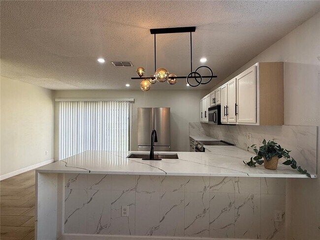 Building Photo - 10497 Sun Villa Blvd