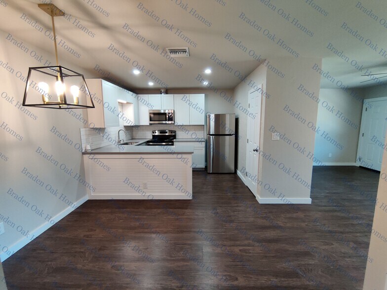 Modern kitchen and dining area - 1814 26th St W
