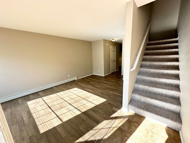 Building Photo - Introducing the Perfect Townhouse Steps Away from Central WA University!