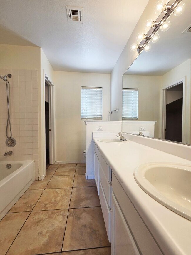 Building Photo - Spacious 4-Bedroom Corner Lot Home with Covered Patio