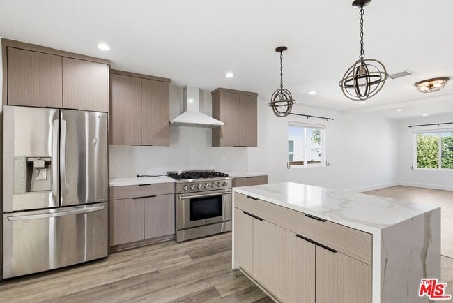 Building Photo - 6415 Madden Ave