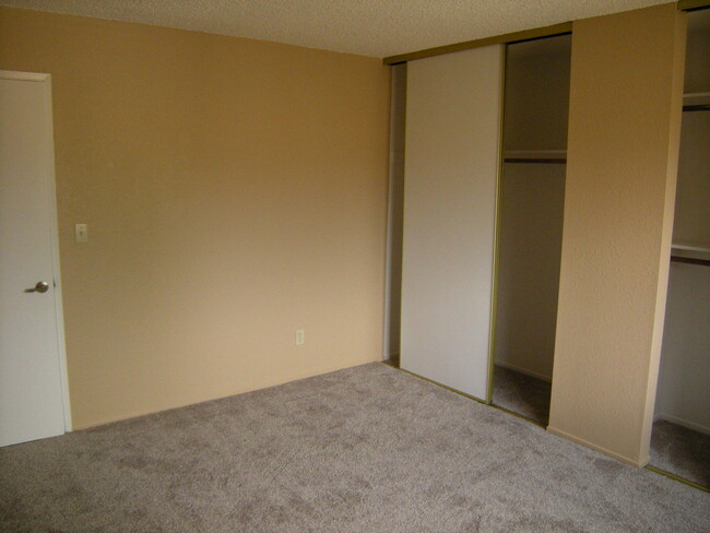 Building Photo - Condo unit featuring updated kitchen with ...