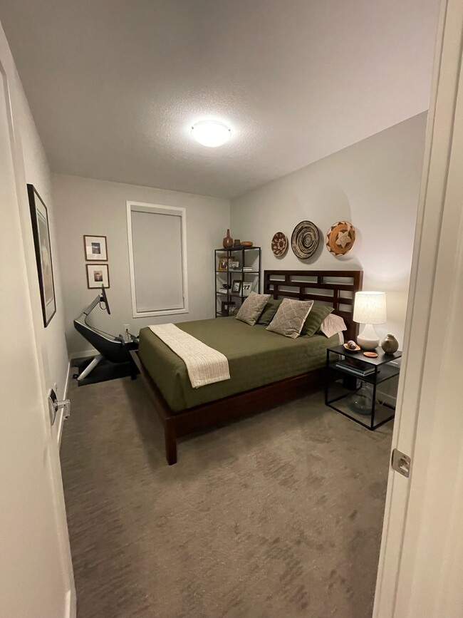 Guest Bedroom 1 with walk-in closet. - 216 E Center St