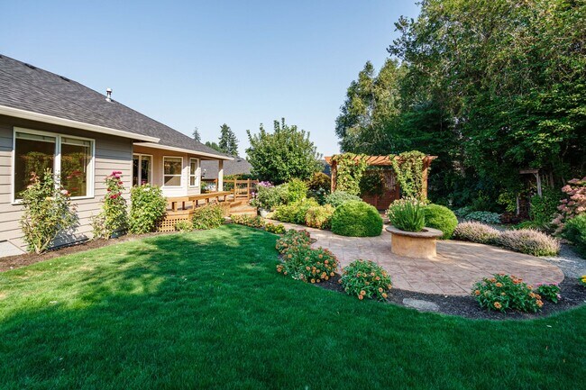 Building Photo - Beautifully Landscaped 1/4 acre with Well Maintained 4 bedroom 2 Bath Home with 3 Car Garage