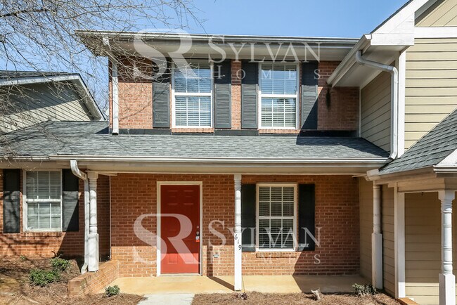 Building Photo - Charming 3BR 2.5BA Townhome Ready for Move...