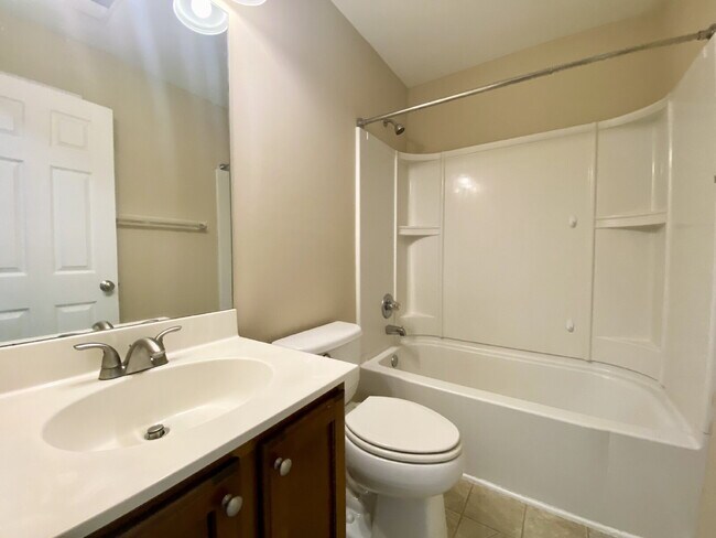 Building Photo - Spacious, Four Bedroom Townhouse With a View!
