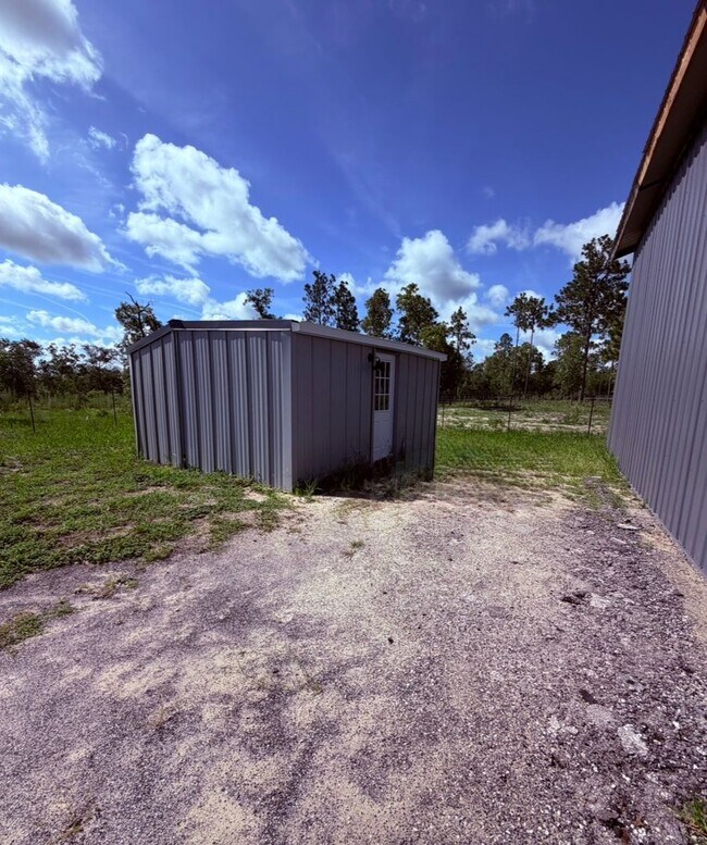Building Photo - Gated 10-Acre Luxury Retreat with 40x60 Shop & Barn!