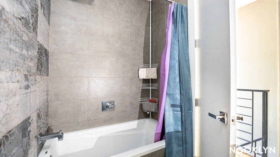 Building Photo - 18-15 Putnam Ave